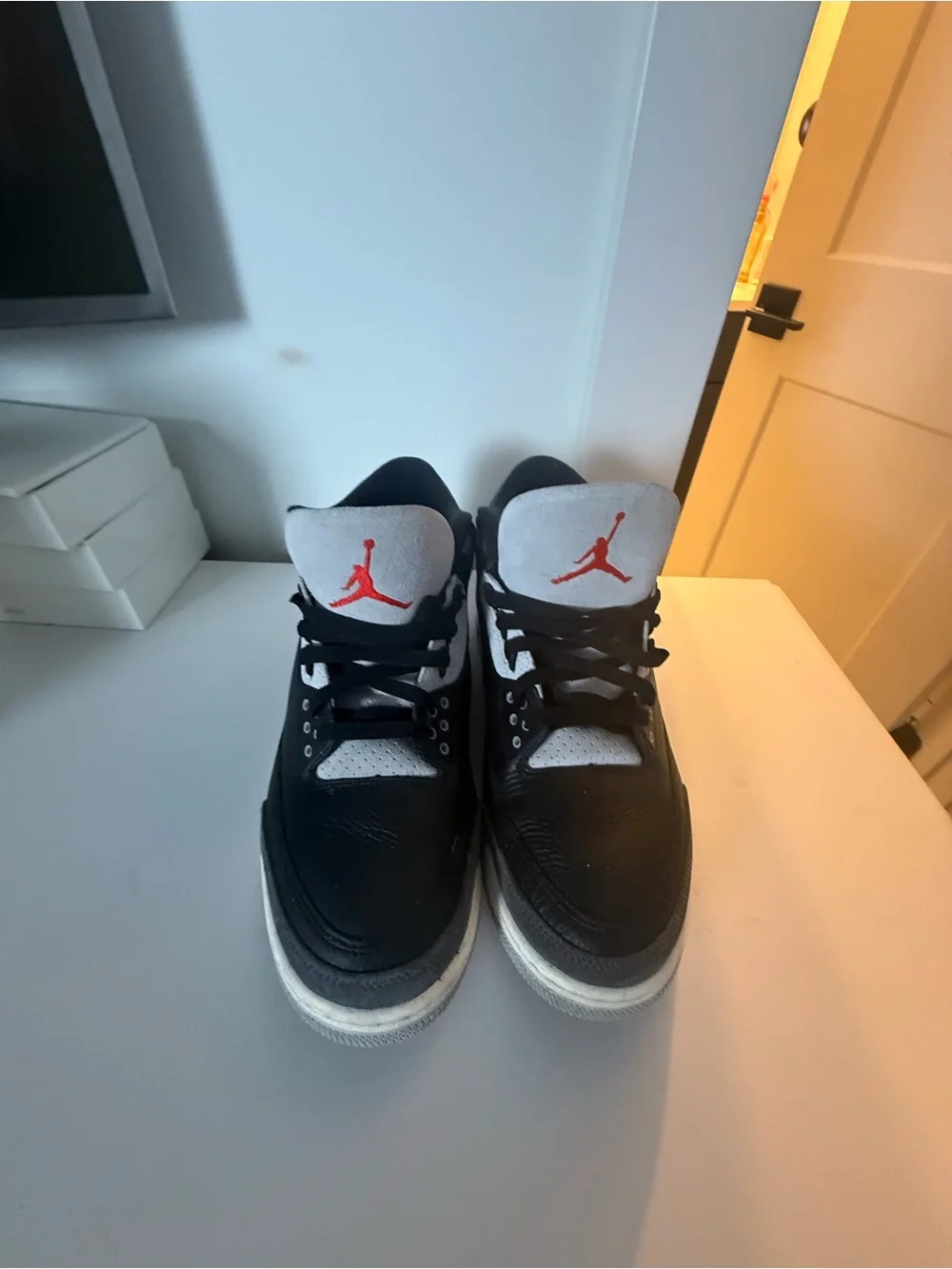 Jordan Retro Black and White Men’s Sneakers with Blue Accent